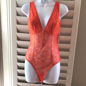 GUESS orange lace thong bodysuit, size S